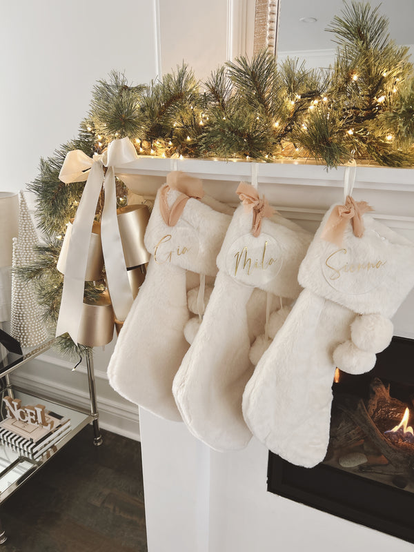 Cream Christmas stocking with Pom poms and acrylic tag